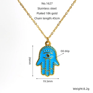 Detail view of 18K gold plated Hamsa pendant with blue enamel and dimensions