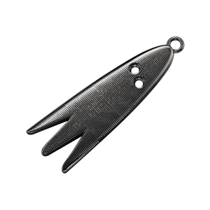 Detailed close-up of a black metal fish lure with textured surface and triple prong tail