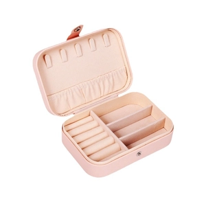 Pink PU leather portable jewelry organizer box with hooks and ring slots shown at 45-degree angle