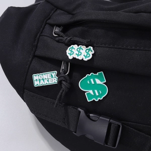 Black canvas bag with green Money Maker badges and dollar sign PVC decorative buckles