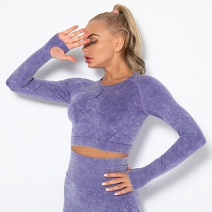 Close-up of purple acid wash seamless yoga top showing thumb holes and ribbed texture
