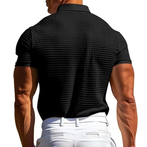 Rear view of men's black waffle polo shirt featuring breathable mesh knit texture