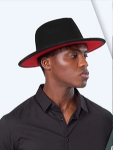 Detailed side view of a black wool fedora featuring a vibrant red underside of the brim