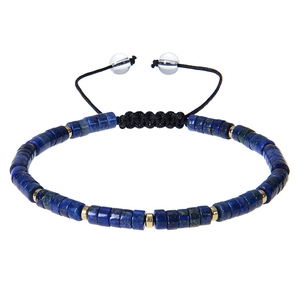 Detail of adjustable lapis lazuli woven bracelet with golden beads and black cord