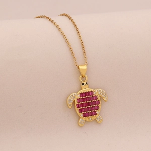 Golden sea turtle pendant necklace with red square crystals and clear zircons
