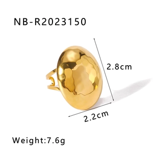 Detail of 1K gold stainless steel heart ring with hammered texture and size measurements