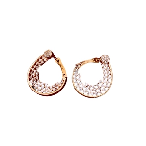 18K gold plated flower twisted hoop earrings with sparkling cubic zirconia on white background