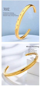Detail of star-patterned gold bangle with vacuum plating and mirror polished finish