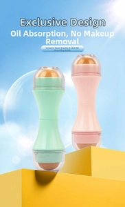 Close-up of double-headed volcanic stone oil-absorbing roller in mint and pink