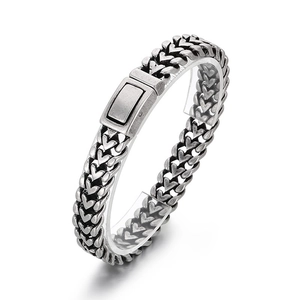 Bracciale cuore vintage con catena intrecciata argento e chiusura rettangolare su base