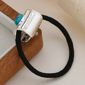 Bohemian elastic hair tie with silver engraved metal bead and turquoise stone detail