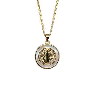 Golden St. Benedict medallion necklace featuring iridescent white shell inlay details