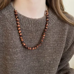 Tiger eye beaded necklace for women featuring natural brown stone texture and silk gloss