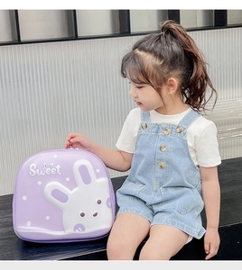 Detail of purple cartoon rabbit hard shell backpack with Sweet print for kids
