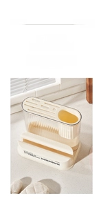 Detail of cream-white knife holder showing deep slots and vertical stripe texture