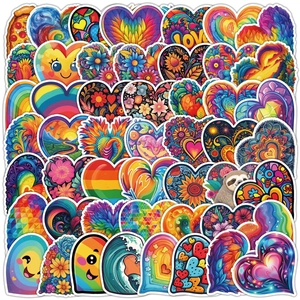 Detailed flat lay of diverse heart-shaped waterproof stickers with colorful patterns