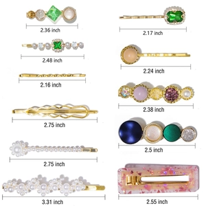 Detailed view of acetate hair clip set with pearl and resin accents and size dimensions