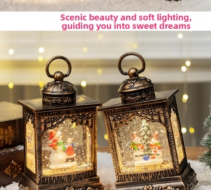 Close-up of vintage bronze Christmas lanterns with warm LED lights and snowman scenes