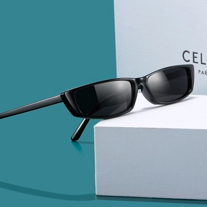 Retro rectangular sunglasses with black frames and dark lenses for a modern chic look