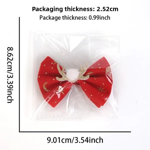 Detailed view of red Christmas bow hair clip showing package dimensions and elk antler design
