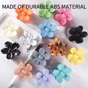 Matte floral hair claws in multiple colors made of durable ABS material for women