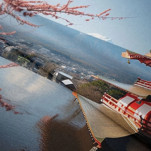 Detail of bohemian tapestry featuring Mount Fuji and cherry blossoms on thick fabric