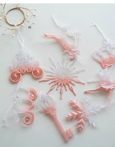 Pink and white gradient Christmas ornaments including ballet girl and snowflake details