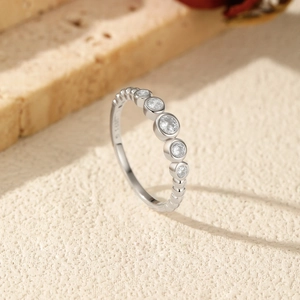 Minimalist S925 silver bubble ring with five sparkling round moissanite stones on stone