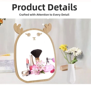 Detail of wooden desktop vanity mirror with reindeer antler design and makeup setup