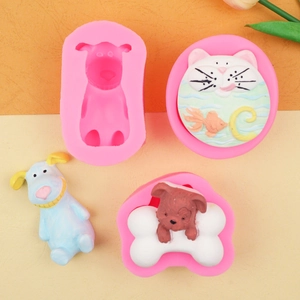 Detail of pink silicone molds with finished 3D dog, cat face, and bone-shaped crafts