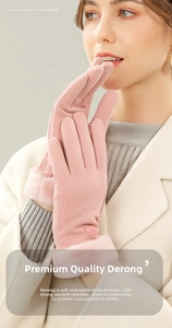 Detail of pink winter gloves with thick faux fur cuffs and fashion brand label for women