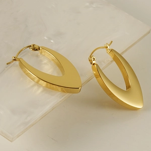 Modern V-shaped geometric gold earrings with a high-polished mirror finish in 18K stainless steel