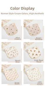 Detail showing six styles of 6-layer cotton muslin U-shaped baby bibs in soft cream colors