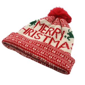 Winter festive Christmas knitted hat with Merry Christmas text and red pompom detail