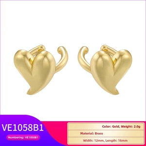Detail view of heart-shaped gold brass ear cuff with 12x16mm dimensions and 2g weight