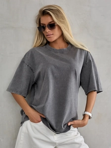 Detail of gray oversized washed cotton T-shirt with drop shoulders and vintage texture
