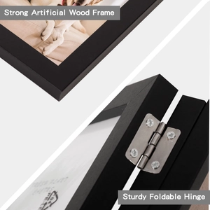 Close-up of durable silver metal hinges on a black wooden triple folding photo frame