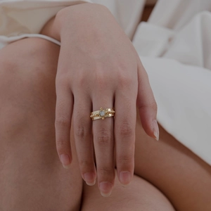 18K gold plated stainless steel wide ring with hammered texture and white round gemstone
