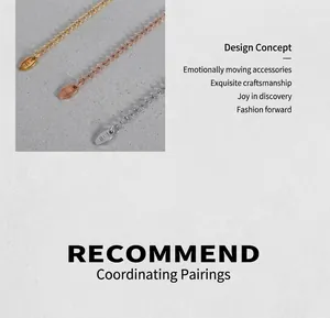 Detail of 18K gold-plated stainless steel extension chains with K18 engraved tags