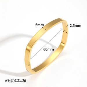Detail showing 6mm width and 60mm diameter dimensions of the gold stainless steel bangle