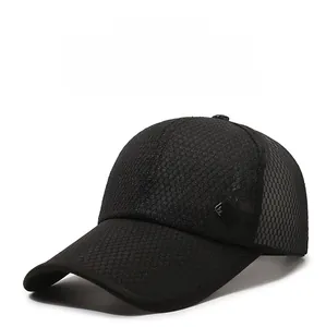 Detail of breathable mesh fabric and metal mountain logo on black outdoor baseball cap