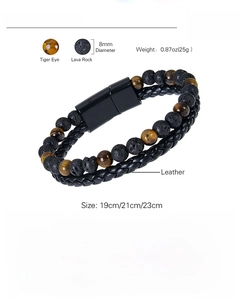 Detail showing braided leather cord with tiger eye stones and magnetic clasp