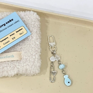 Cute beaded phone strap with light blue ceramic fish beads and silver heart pin charm