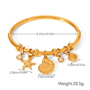 18k gold plated stainless steel bangle featuring sea star and shell charms with white crystals