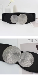 Detail of black elastic wide waist belt featuring silver sunburst circular metal buckles