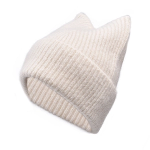 Close-up of cream white cat-ear knit hat showing detailed ribbed texture and soft wool