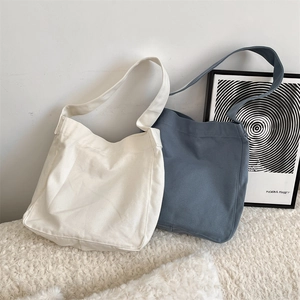 Borsa tote in tela spessa stile minimalista in crema e blu con spallacci larghi