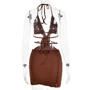 Detail of dark brown knitted halter top and mini skirt set with hollow-out tie strings