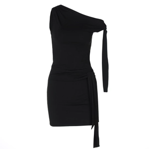 Detailed close-up of a black one-shoulder mini dress with elegant side-tie ribbons