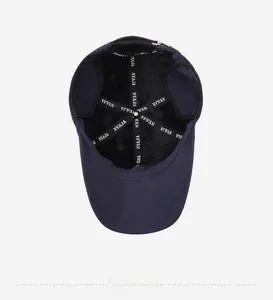 Detail view of the baseball cap's inner fleece lining and reinforced stitched seams